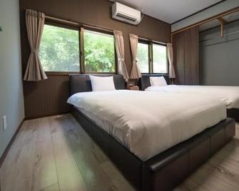 Tabinoteitaku Karstvilla - Motobu - Ložnice