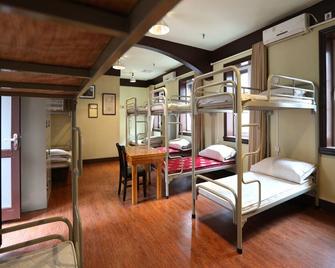 Qingdao Wheat Youth Hostel - Qingdao - Schlafzimmer