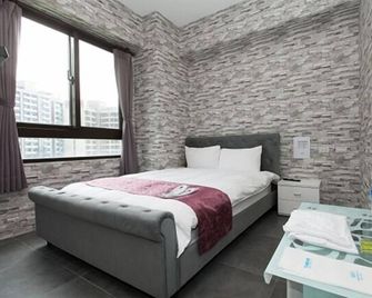 Yixiang Spring Travel - Jiaoxi - Schlafzimmer