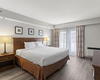 Travelodge Suites by Wyndham Regina / Eastgate Bay - Regina - Slaapkamer