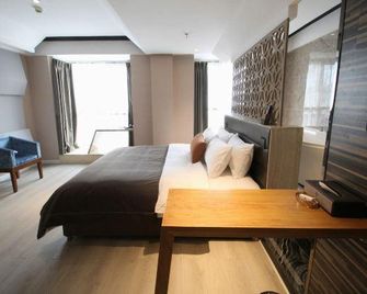 sinweier hotel - Mianyang - Schlafzimmer