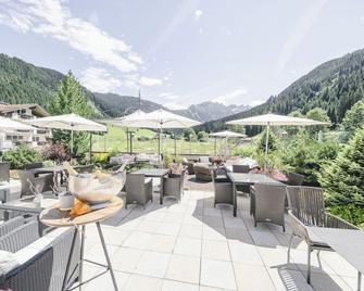 Traumhotel Alpina Superior Adults only Hotel - Gerlos - Patio
