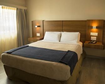 Hotel Tower House Suites - Panama City - Bedroom
