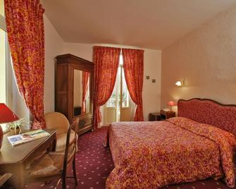Hôtel Le Cro-Magnon - Les Eyzies-de-Tayac-Sireuil - Slaapkamer