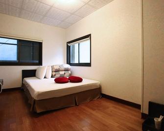 Fenchihu Street Hotel - Zhuqi Township - Bedroom