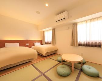 Smile Hotel Miyakojima - Miyako-jima - Schlafzimmer