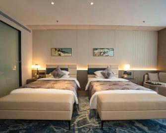 Saussurea Hotel - Karamay - Habitación