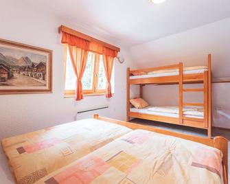 Authentic Pohorje house with riverside outdoor sauna - Oplotnica - Bedroom