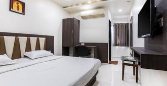 Hotel Ashish - Ahmedabad - Bedroom