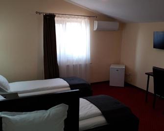 Motel Diamant - Amara - Camera da letto