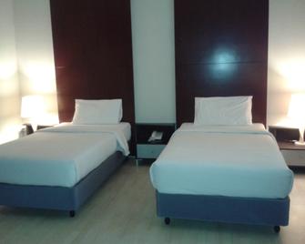 Ginasuite Kompleks27 Hotel - Bandar Seri Begawan - Bedroom