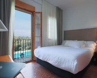 Hotel Tugasa El Almendral - Setenil de las Bodegas - Schlafzimmer