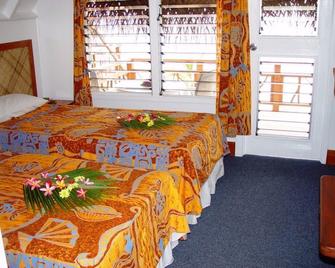 Paradise Cove Lodge - Arutanga - Bedroom
