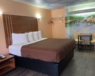 إكزكيوتيف إن آند سويتس نير لاكلاند إه ف ف بي - سان انطونيو - غرفة نوم