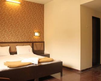 Hotel Ganesh Palace - Mumbai - Camera da letto