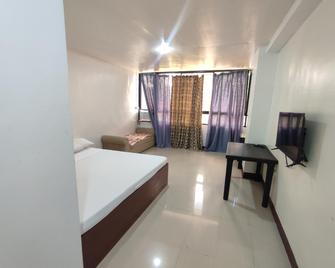 Green Ridge Apartelle - Malaybalay - Bedroom