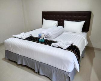 Victory Hotel - Ruteng - Habitación