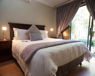 InnJoy Boutique Hotel - Centurion - Habitación
