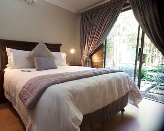 InnJoy Boutique Hotel - Centurion - Habitación
