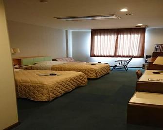 Business Hotel Kawakami Kumano - Kumano - Спальня