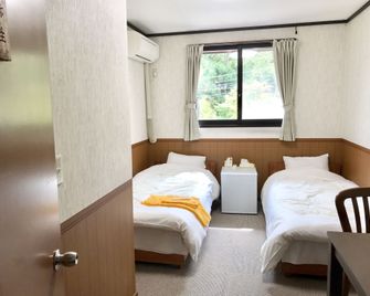 Pension Lanpou - Fujikawaguchiko - Phòng ngủ