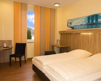 Hotel Neumarkt - Neumarkt i.d.OPf. - Camera da letto