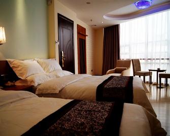 Chuanghui Business Hotel - Cantón - Habitación