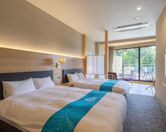 Deluxe Room with private openair bathwith bathroom and toilet / Gujo Gifu - Gujō - Bedroom
