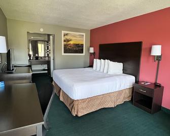 Days Inn by Wyndham Jellico - Tennessee State Line - Jellico - Schlafzimmer