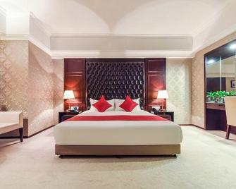 Zhuhai Junyi International Hotel - Zhuhai - Bedroom