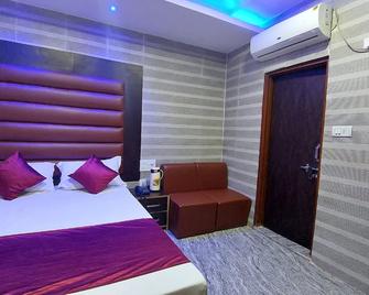 Goroomgo Shimla Inn Lucknow - Lucknow - Bedroom