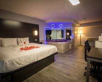Envi Boutique Hotel - Henderson - Slaapkamer