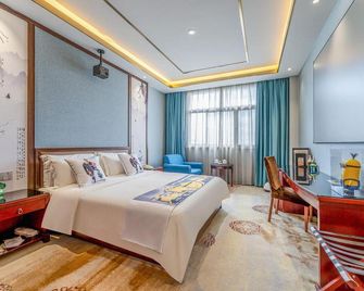 Rezen Qingjie Hotel (Jining Broadcasting Boutique) - Jining - Bedroom