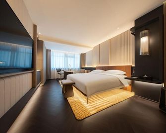 Shandong Litian Hotel - ז'ינאן - חדר שינה