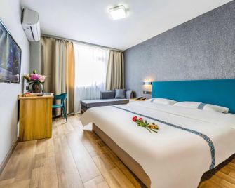 7Days Inn Tianjin Binhai New District Government - Tianjin - Schlafzimmer