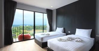 The Wind Hotel - Pattaya - Schlafzimmer