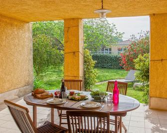 location de vacances figuier avec jardin barbecue piscine chauffée à Calvi - Calvi - Patio