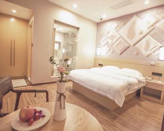 Huifeng Xiangxing Hotel - Liuzhou - Ložnice