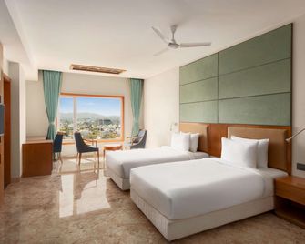 Howard Johnson by Wyndham Udaipur Roop Nagar - Udaipur - Schlafzimmer