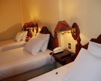 Hotel Casona Colon Inn - ปูโน - ห้องนอน