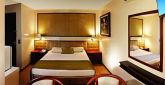 Lira Hotel - Curitiba - Schlafzimmer