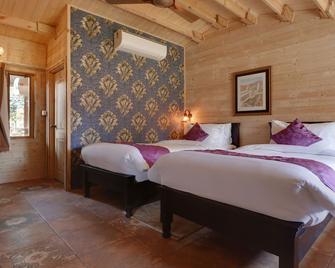 Treebo Premium Blue Mountain Country Club And Resort - Siliguri - Bedroom