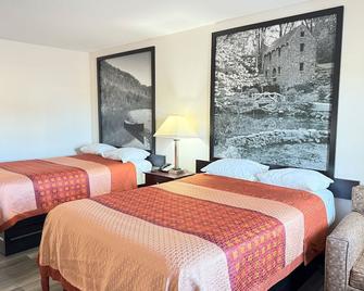 Super 8 by Wyndham Monticello AR - Monticello - Schlafzimmer