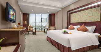 Ouli Haoting Hotel (Yongzhou Lengshuitan Municipal Committee) - Yongzhou - Bedroom