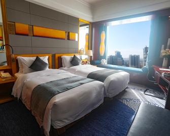 Zhuhai Charming Holiday Hotel - Zhuhai - Habitación