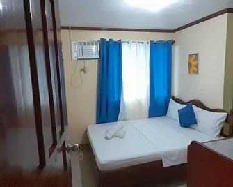 Coralyn's Place small room with private toilet and kitchenette - Malay - Bedroom