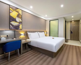 7 Days Premium Zhuhai Gongbei Port - Zhuhai - Schlafzimmer