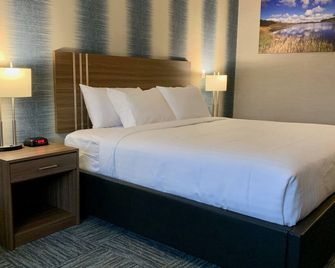 مريديان إن آند سويتس ريجينا ايربورت - ريجينا - غرفة نوم