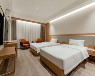 Yunlong Hotel - Xinzhou - Bedroom