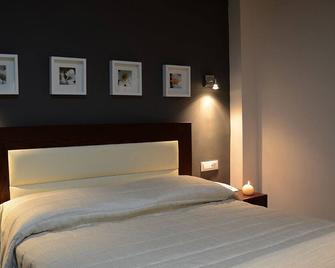 Amphitryon Boutique Hotel - Rodi - Camera da letto